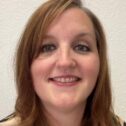 A portrait photo of Angela, a member of the Wellbeing Matters team