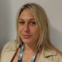 A portrait photo of Hollie, a member of the Wellbeing Matters team