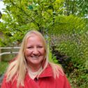 A portrait photo of Sarah, who was supported by Wellbeing Matters